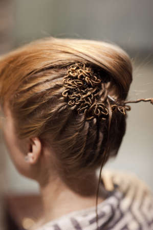 Hairstyle of the bride. Beautiful wedding hairstyle for the bride. Large with details