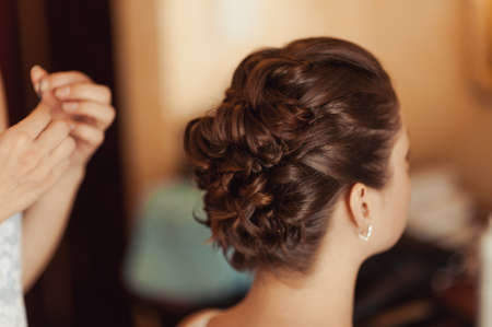 Hairstyle of the bride. Beautiful wedding hairstyle for the bride. Large with detailsの写真素材