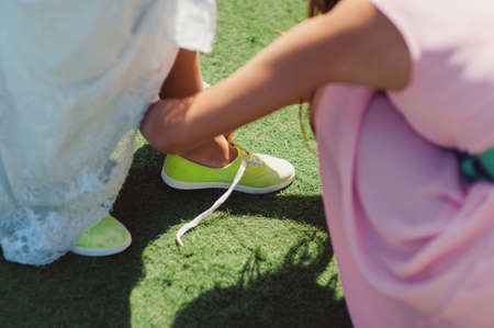Bride Putting On Wedding Shoesの写真素材