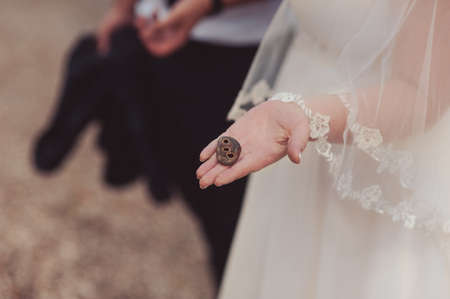 arms and legHands and feet of the bride. Close-ups, hands together, fingerssの写真素材