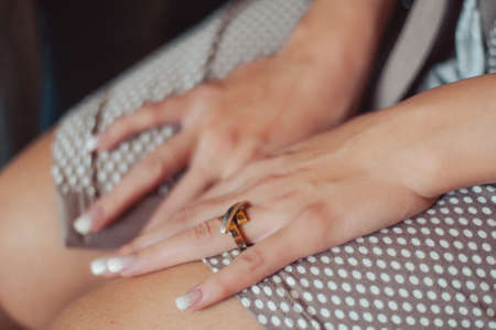 arms and legHands and feet of the bride. Close-ups, hands together, fingerssの写真素材