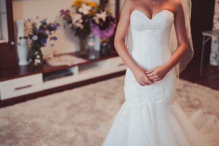 arms and legHands and feet of the bride. Close-ups, hands together, fingerssの写真素材