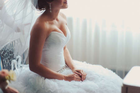 arms and legHands and feet of the bride. Close-ups, hands together, fingerssの写真素材