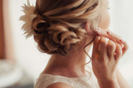 Bride and earrings. Beautiful jewelry for the bride