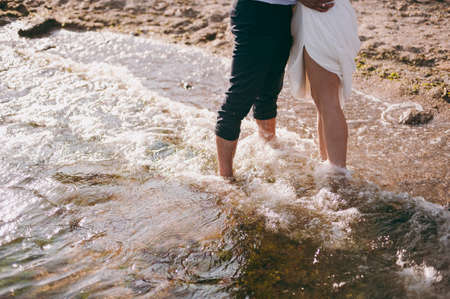 Groom and bride on the beachの写真素材