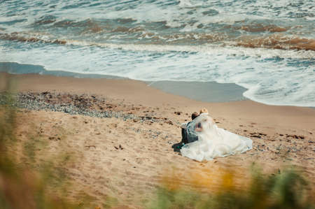 Wedding couple bride and groom on a walkの写真素材