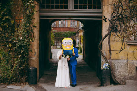 Wedding couple bride and groom on a walkの写真素材