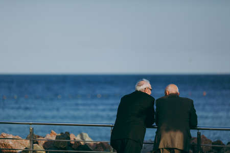 The two man looking at the seaの写真素材