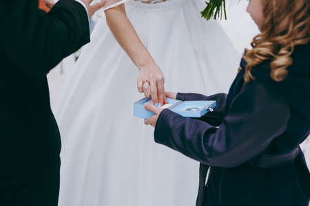 little girl or boy Carrying Wedding Ring On Cushionの写真素材