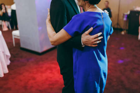 Couple dancing at the wedding, hands bigの写真素材