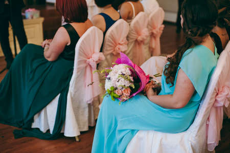 nice women with flowers in handsの写真素材