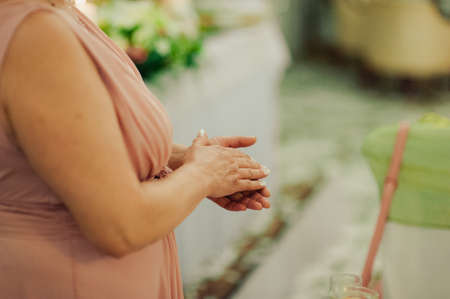 people applauding, clapping hands at wedding reception or meetingの写真素材