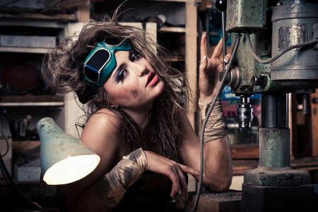 Girl wearing a helmet in the boiler roomの写真素材