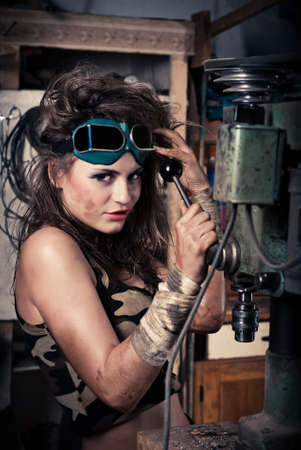 Girl wearing a helmet in the boiler roomの写真素材