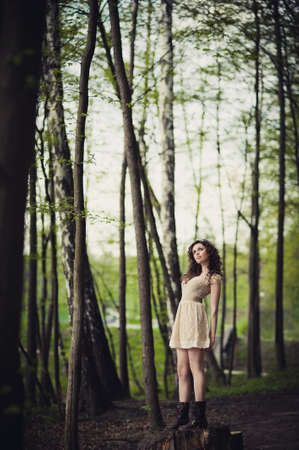The girl is walking in the parkの写真素材