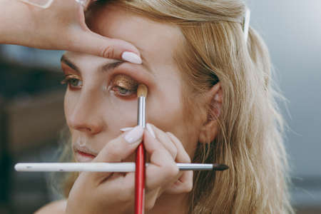 Make-up and hairstyle for a modelの写真素材