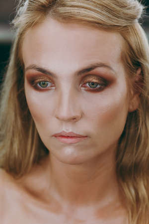 Make-up and hairstyle for a modelの写真素材