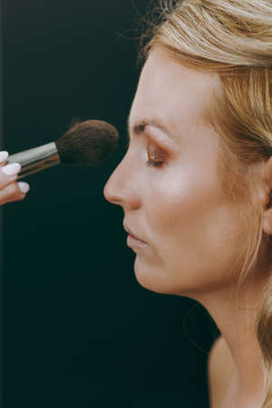 Make-up and hairstyle for a modelの写真素材