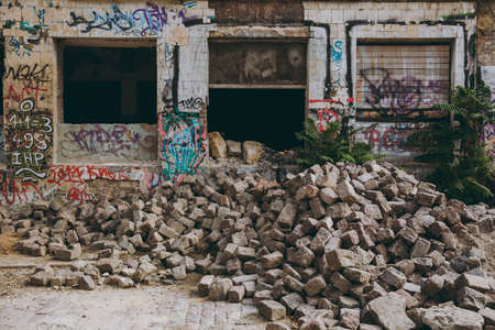 Odessa, Ukraine, 10-12-2017:Industrial building of with graffiti and street art on shabby walls and...