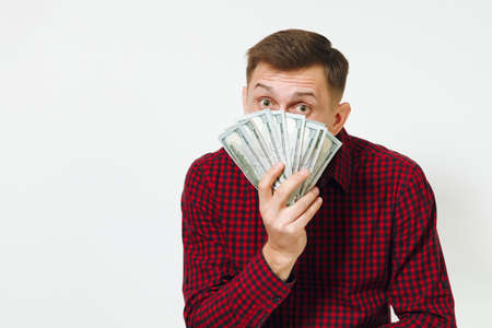 Handsome cheerful positive satisfied caucasian lucky young happy business man 25-30 years in red...