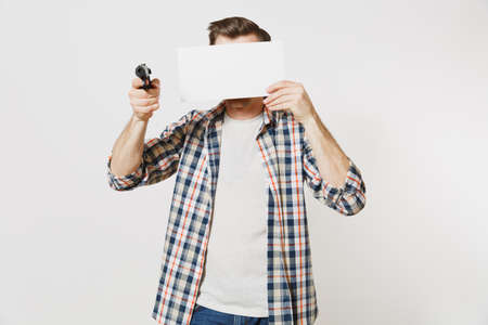 Man holding gun, blank empty sheet card, copy space isolated on white background.の写真素材