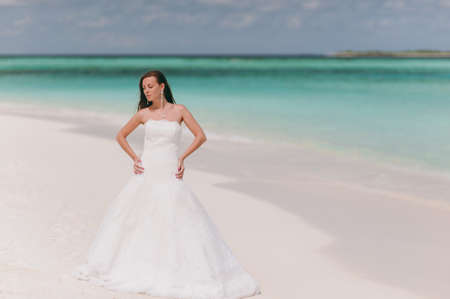 The beautiful bride on the beach of the islandの写真素材