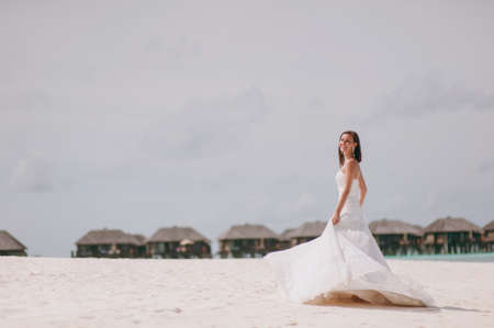 The beautiful bride on the beach of the islandの写真素材