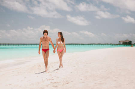 The couple in love on the beach on the islandの写真素材