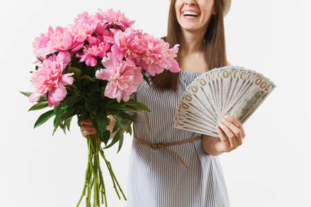Young pretty happy woman in blue dress, hat holding bundle of dollars, cash money, bouquet of...