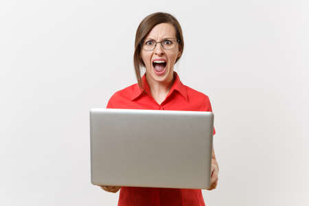 Portrait of beautiful young business teacher woman user in red shirt glasses working typing on...