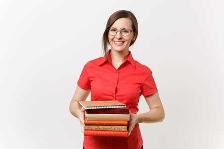 Portrait of beautiful young business teacher woman in red shirt, black skirt and glasses holding...