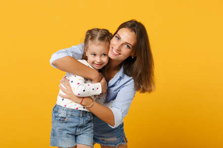 Woman in light clothes have fun with cute child baby girl 4-5 years old. Mommy little kid daughter...