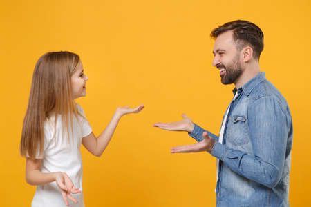 Side view of smiling bearded man have fun with child baby girl. Father little kid daughter isolated...