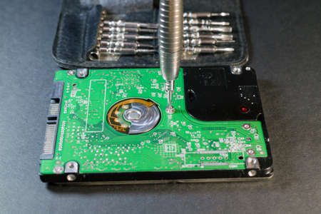 Disassembly of laptop hard disk drive - removal of SATA controller