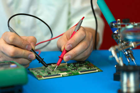 Repair of electronic devices. Measurements of electrical parameters of semiconductor components on a...