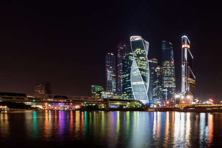Business district of Moscow in the center of the city in colorful night lights. The capital of Russia at dusk.のeditorial素材