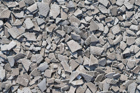 Hipe of broken slate, fragments split tiles background