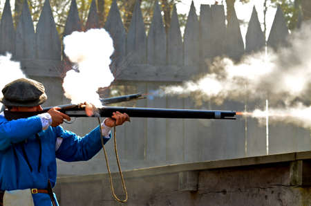 JAMESTOWN, VIRGINIA/USA - MARCH 18, 2012:  Auxillary troops drilling with muskets to protect the early Jamestown Colony from Native American attack at Military through the Ages event on March 18, 2012 at the Jamestown Settlement.のeditorial素材