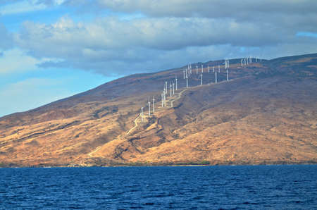 Wind power on the volcanic hills of Maui in Hawaiiの写真素材