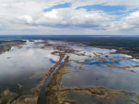 Spring flood on the river. Flooding of meadows Volyn, Ukraine.