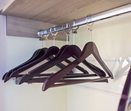 Brown clothes hangersの写真素材