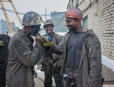 Artemivs'k, Ukraine - August, 06, 2013: Miners mine named Artem rise to the surface after the end of the work shiftのeditorial素材