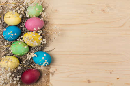 Easter eggs on a wooden backgroundの写真素材