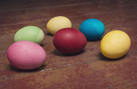 Easter eggs on a old wooden backgroundの写真素材