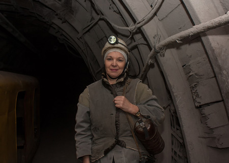 Donetsk, Ukraine - March, 14, 2014: Woman surveyor in the underground mine. Mine is named Abakumovのeditorial素材