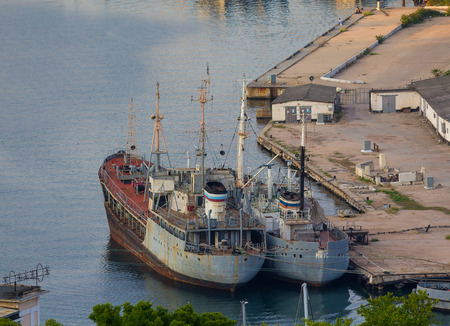Ukraine, Sevastopol - September 02, 2011: Discarded rusty ships in the harbor of Sevastopolのeditorial素材
