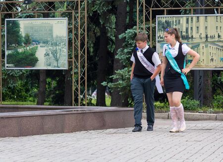 Makeevka, Ukraine - May 29, 2015: Graduates near the fountain. The first issue after the beginning of the military conflict in the territory controlled by the People's Republic of Donetsk.のeditorial素材