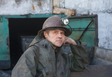 Uglegorsk, Ukraine - March 12, 2014: Miner mine Uglegorskaya near empty trolley