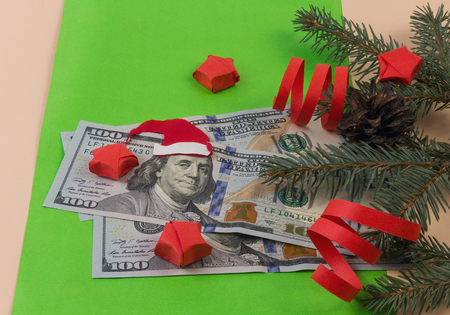 Dollar banknote for Christmas with Santa's hat. Christmas backgroundの写真素材
