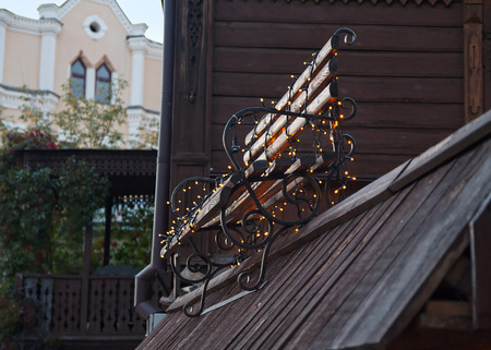 Retro bench and garlands. Architecture and decoration